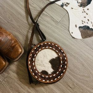 American Darling Purse. Genuine Leather with cowhide fur on it.